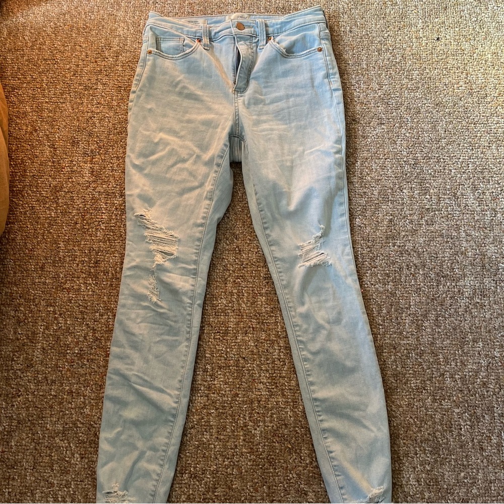 Light wash, high rise distressed skinny jeans